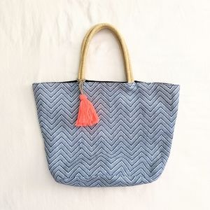 Straw chevron tote with tassel
